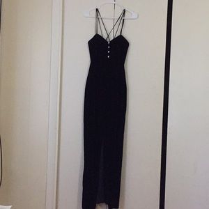 Black velvet slit dress.